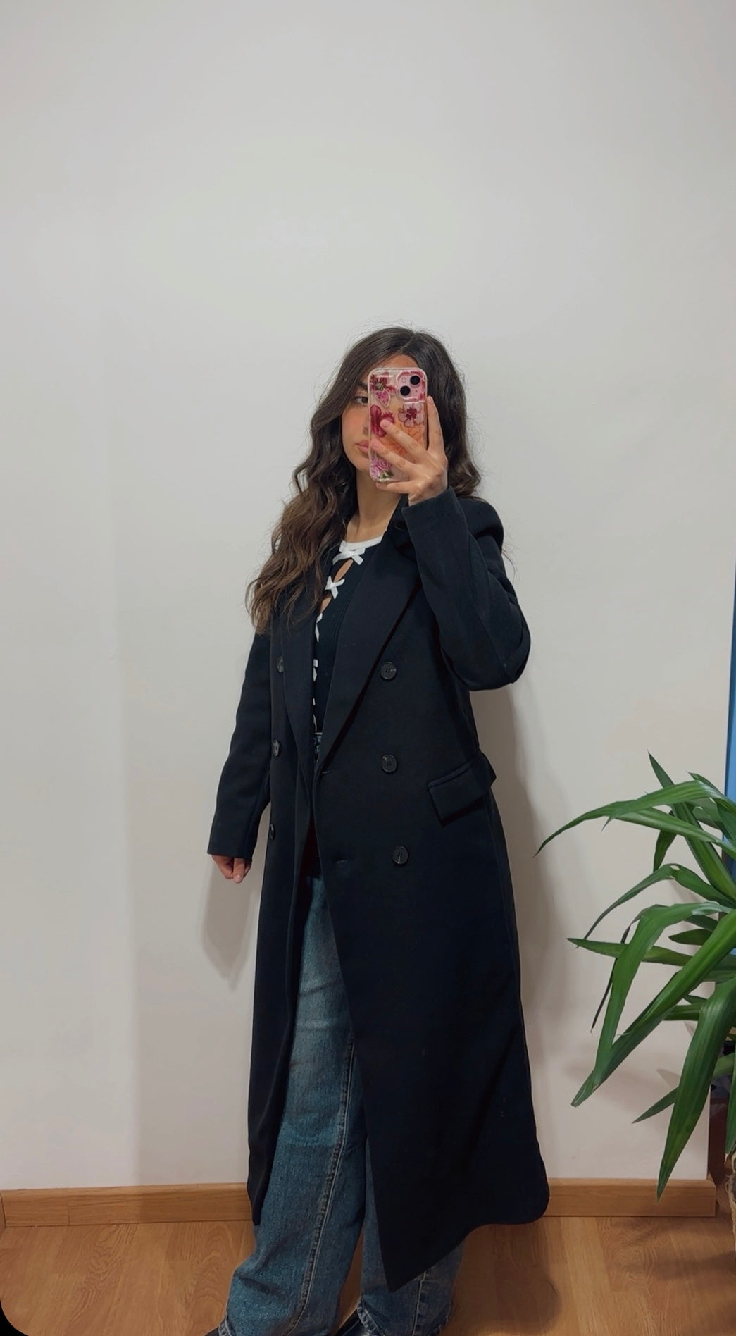 Cappotto nero con bottoni